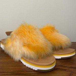 Ugg fur slippers in orange. NWT